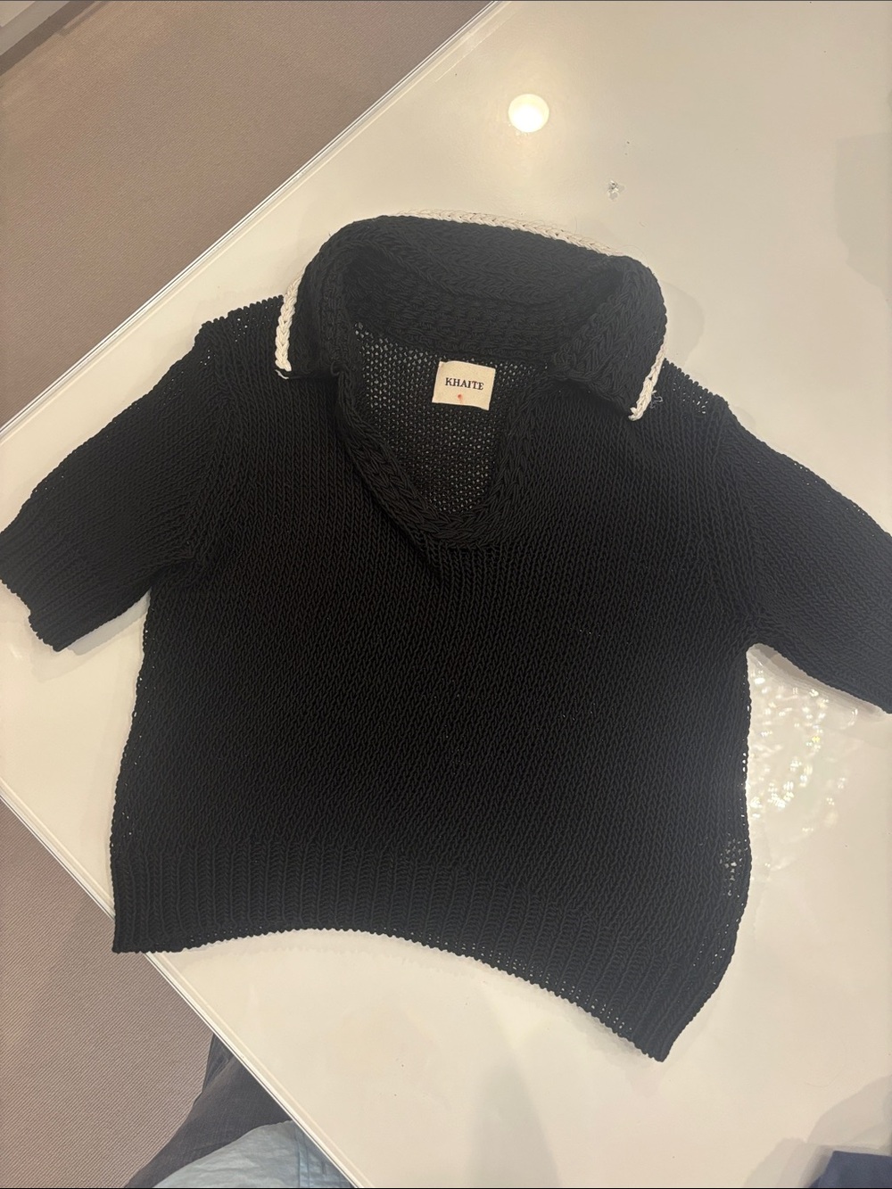 KHAITE Black Short-Sleeve Open-Knit Sweater with White Collar Trim